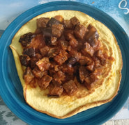 Omelette à l’aubergine grillée et à la tomate